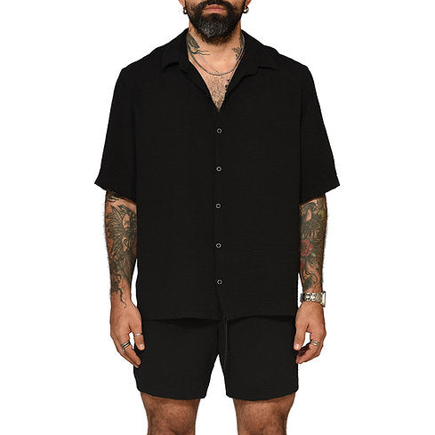 Two-piece set black of boxy fit shirt and beach shorts